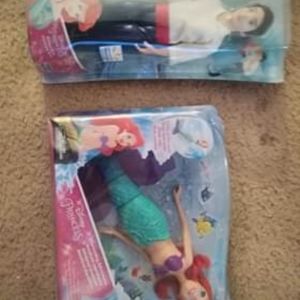 Swimming Ariel Disney doll and Prince eric